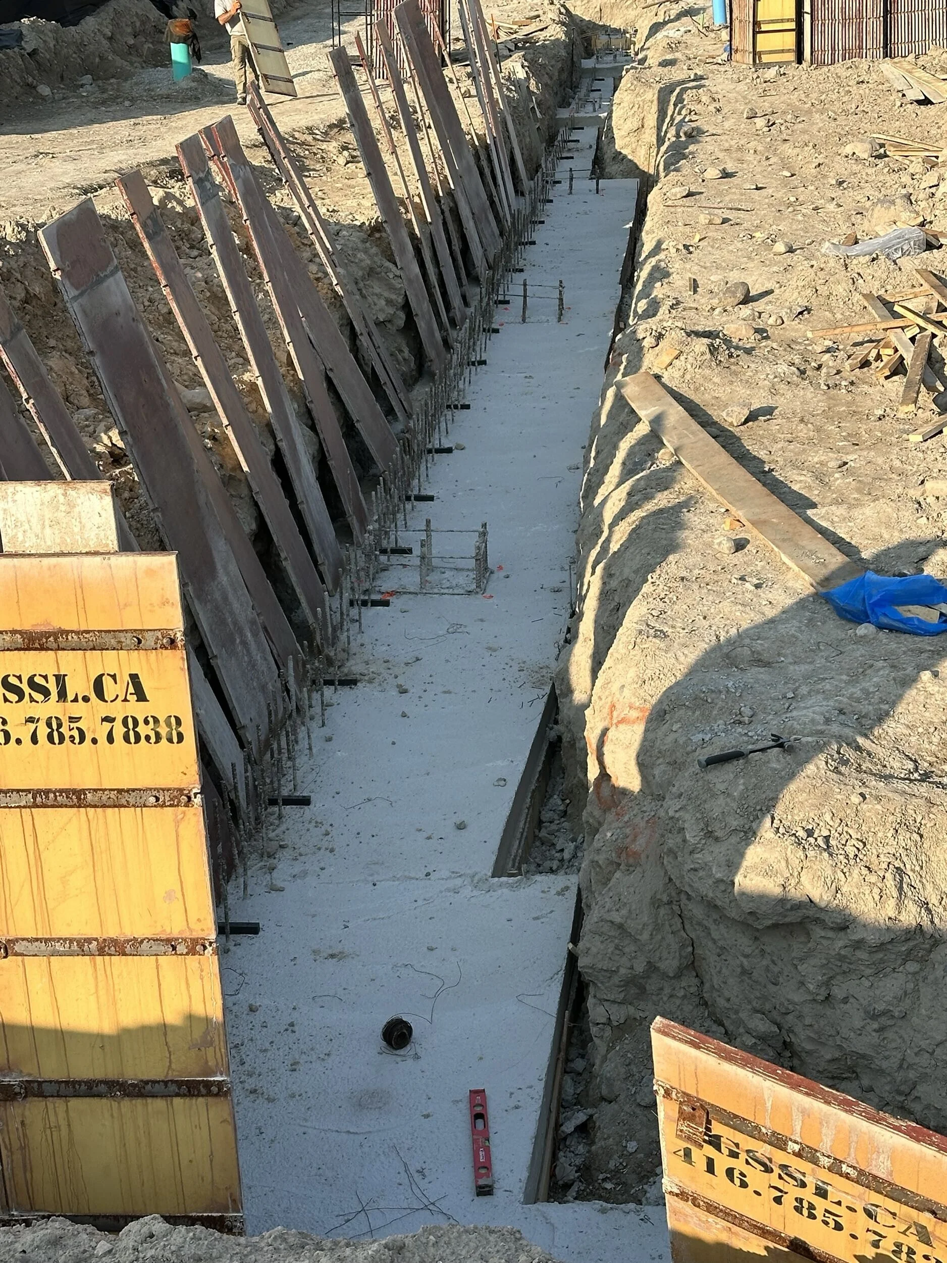 Footings, foundation walls, slabs, underpinning and framing by Grand Structural Services