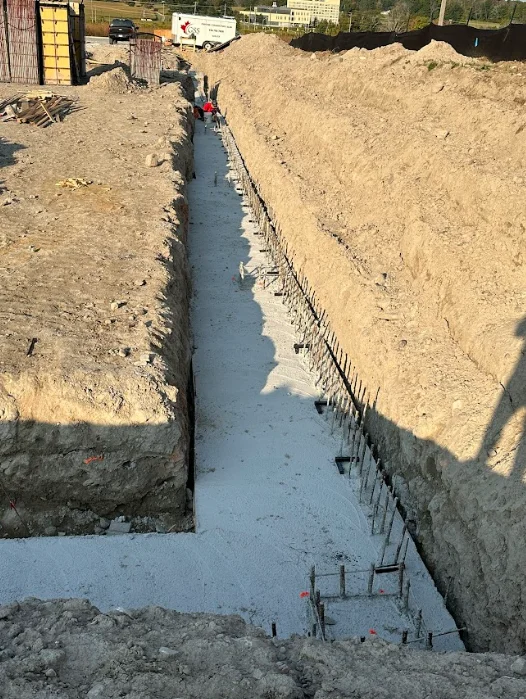 Footings, foundation walls, slabs, underpinning and framing by Grand Structural Services