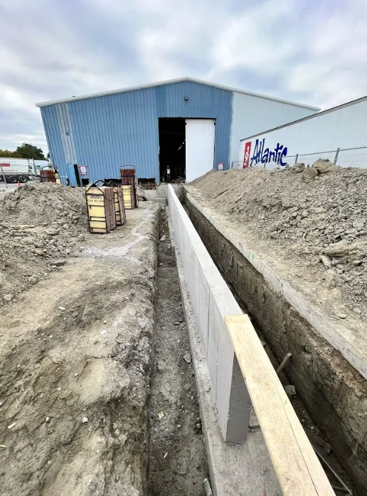 Footings, foundation walls, slabs, underpinning and framing by Grand Structural Services