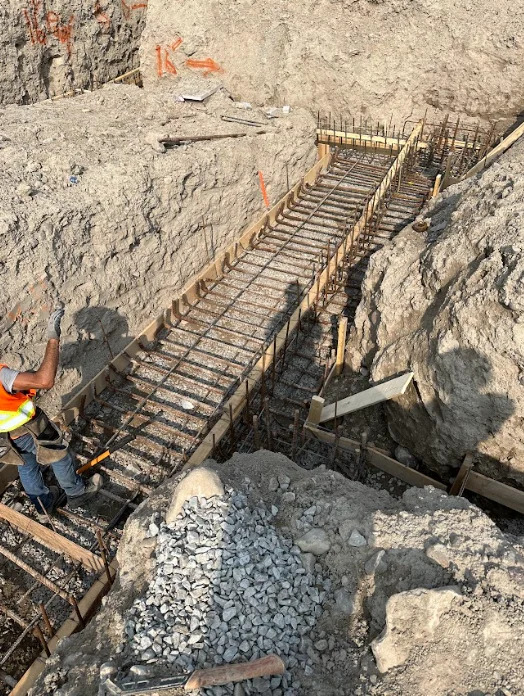 Footings, foundation walls, slabs, underpinning and framing by Grand Structural Services
