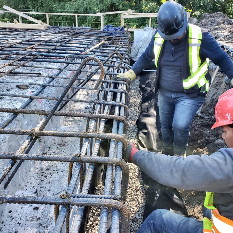 Crew tying rebar, Grand Structural Services, Toronto