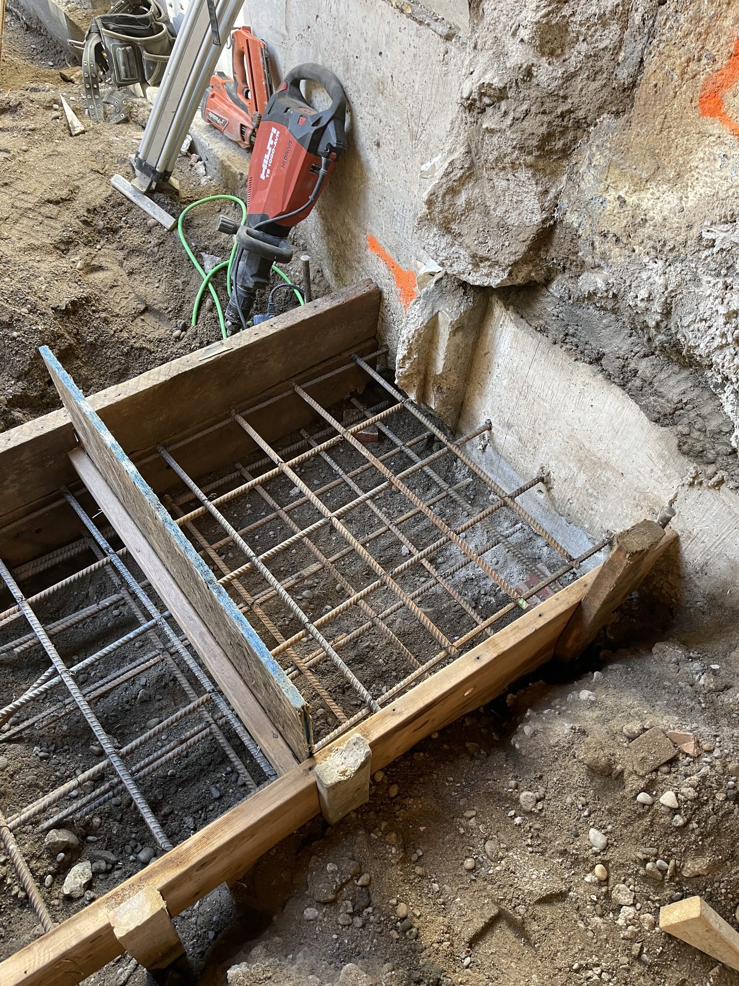 Footings, foundation walls, slabs, underpinning and framing by Grand Structural Services