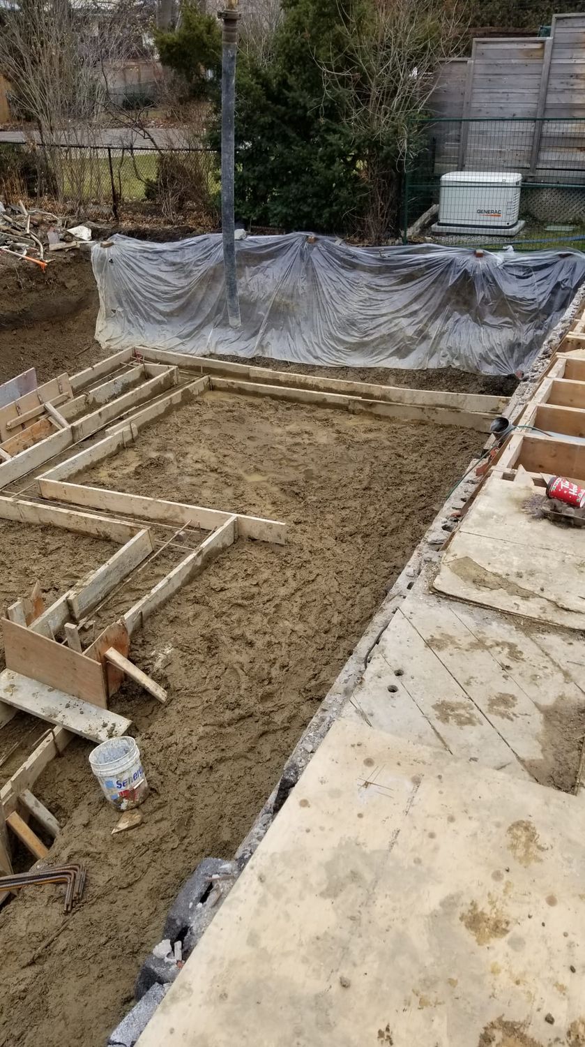 Footings, foundation walls, slabs, underpinning and framing by Grand Structural Services
