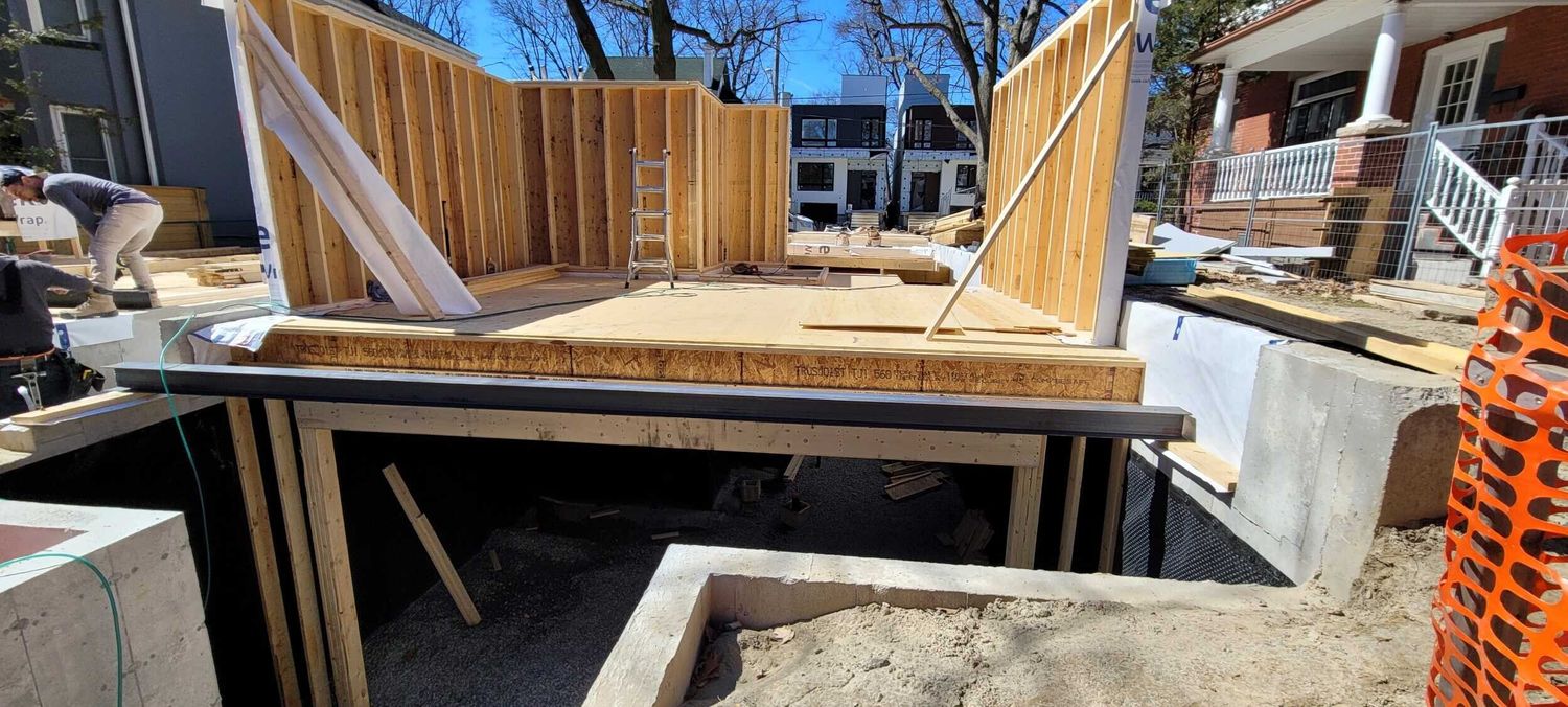 Footings, foundation walls, slabs, underpinning and framing by Grand Structural Services