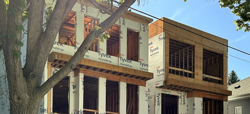 Three-storey infill home framed and wrapped by Grand Structural Services