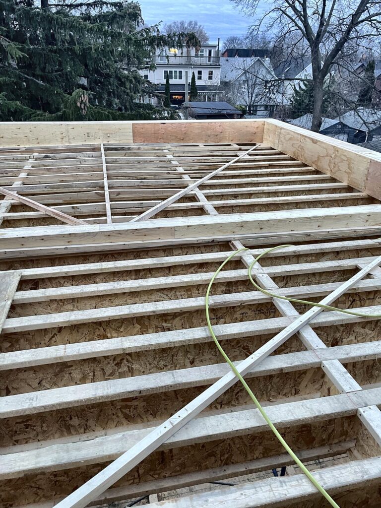 Framing roof joists, house framing in Lawrence Park by Grand Structural Services