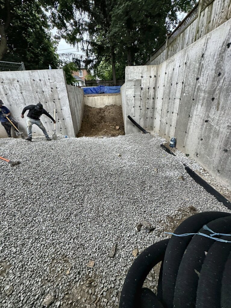 Rear addition basement, poured concrete foundation walls in Willowdale by Grand Structural Services