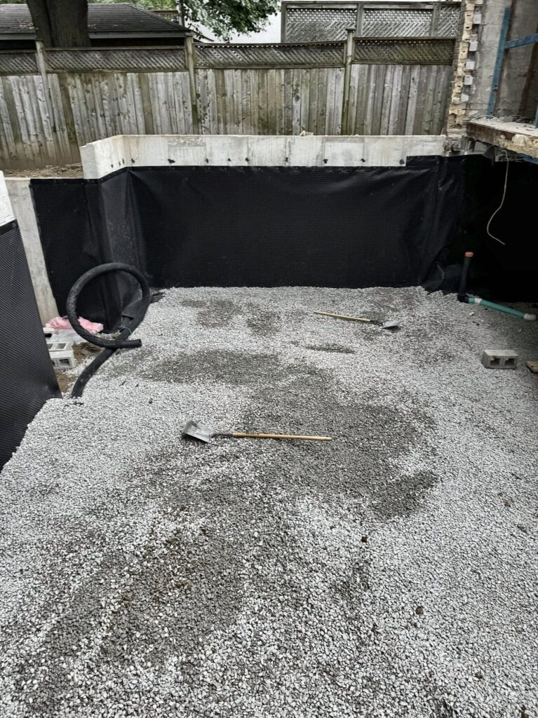 Rear addition basement, poured concrete foundation walls in Leaside by Grand Structural Services
