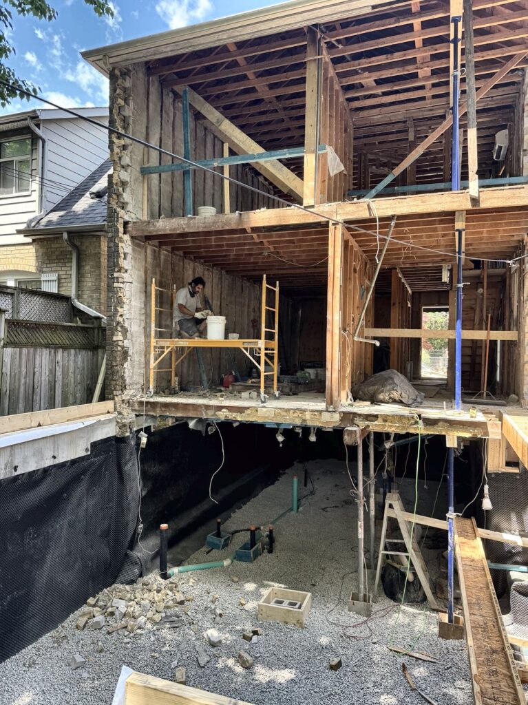 Rear addition basement, poured concrete foundation walls in East York by Grand Structural Services